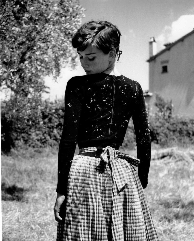 Audrey Hepburn Philippe Halsman Publication Photo: Original Publication Photo, measuring approximately, 10.5"x9" includes white border. Taken in 1955, printed 1997. It comes stamped by the photographer and agency. The photograph is printed on double w