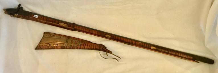 Antique American Flintlock Long Rifle: Antique American Flintlock Long Rifle with swamped barrel. Brass trimmings (30 Cal.?) Squirrel Gun (as-is in 2 pieces) Approx 64" long.