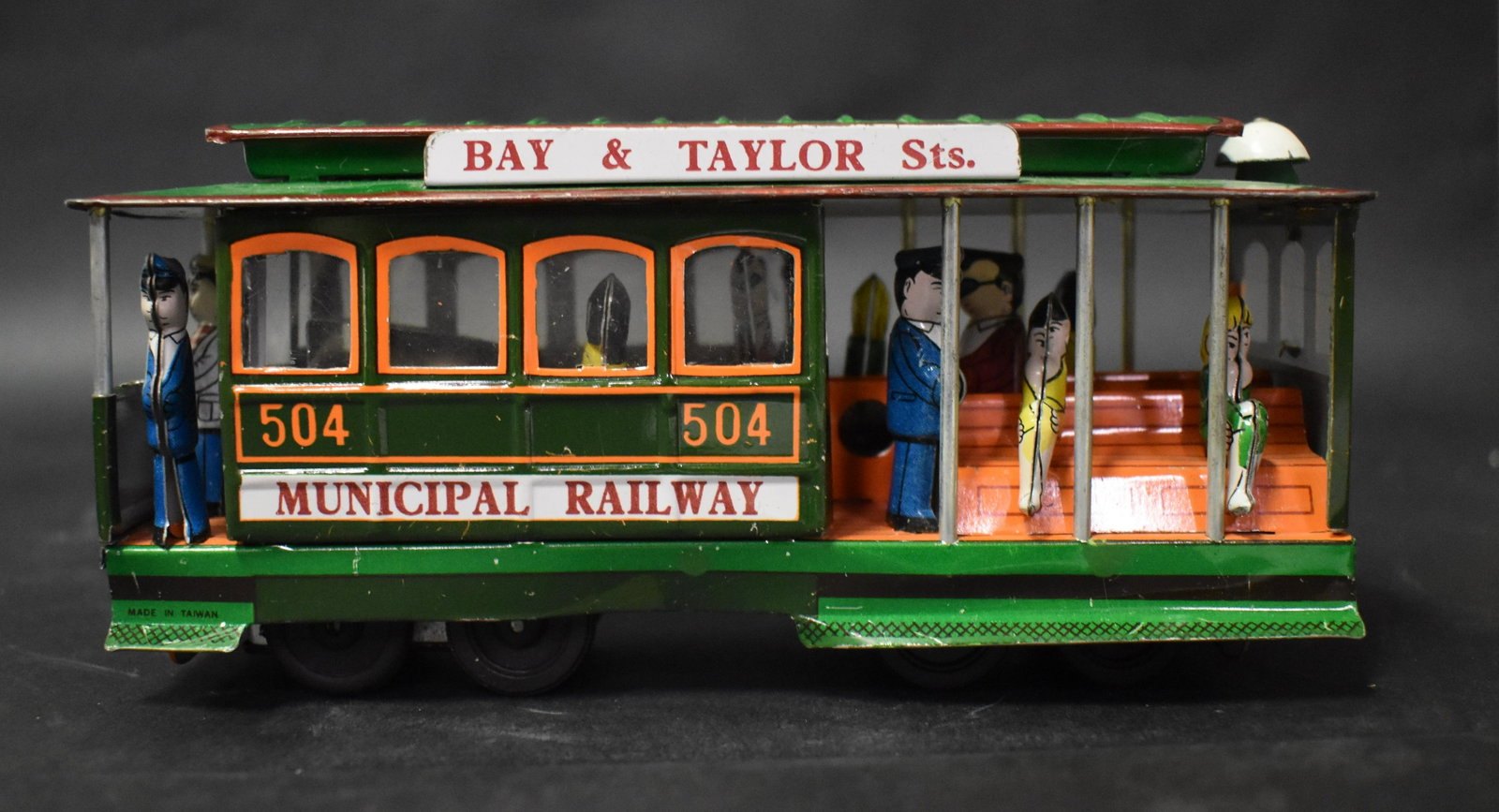 Vintage Tin Trolley Car Toy: Antique Tin Toy-Powell & Mason Sts. Trolley Car, Muni. Railway 504 Bay & Taylor. Dimensions: 7″W x 3-1/4″H x 2-3/4″D