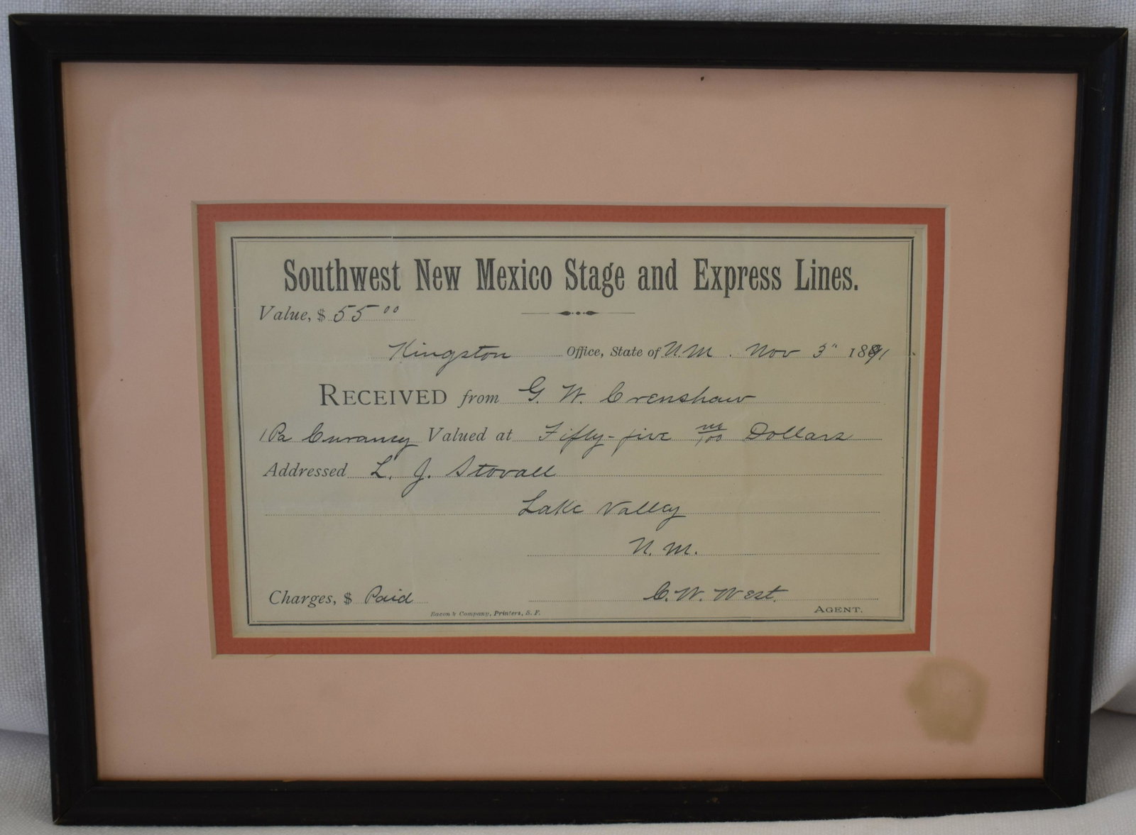 1881 Stage Line Receipt: Southwest New Mexico Stage and Express Lines, Kingston, New Mexico. A receipt for $55 in charges paid. Framed 9-1/2 x 12-1/2