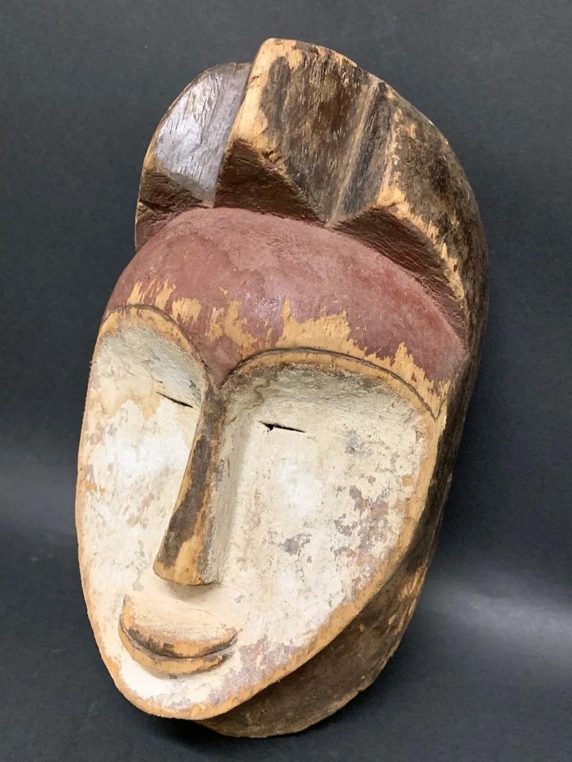 Old Lime Coated West African Mask: Well worn from apparent use, this example, another scarce type from the Vuvi group of Gabon. 11 inches high x 6.5 inches wide