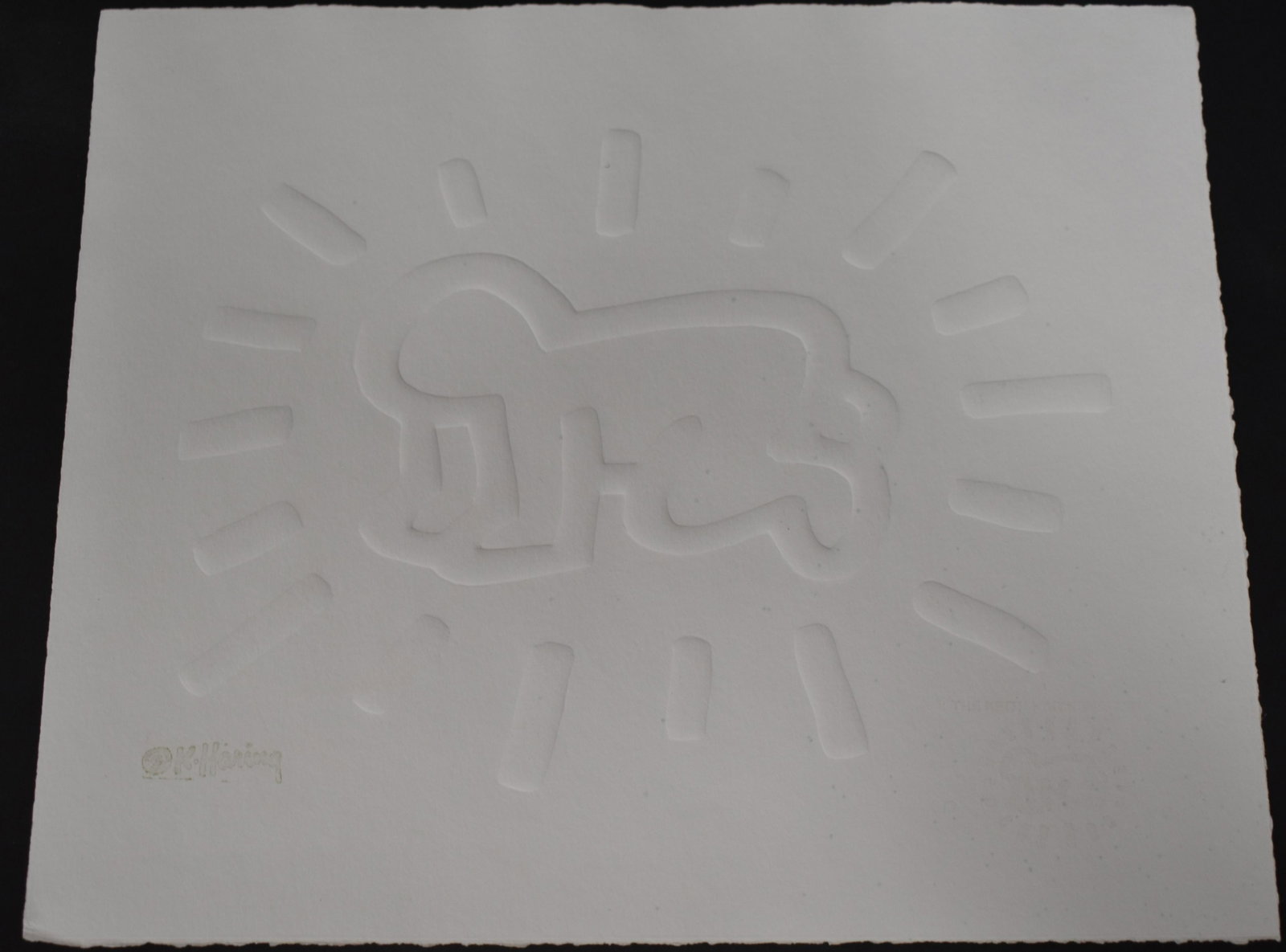 In the manner of Keith Haring Litho Baby: Sgd. In the plate L.L. K. Haring. And also at the back with stamp. Embossed With gallery identification at the back. GAC Galeria de Arte Conteporaneo Barcelona 10 x 12