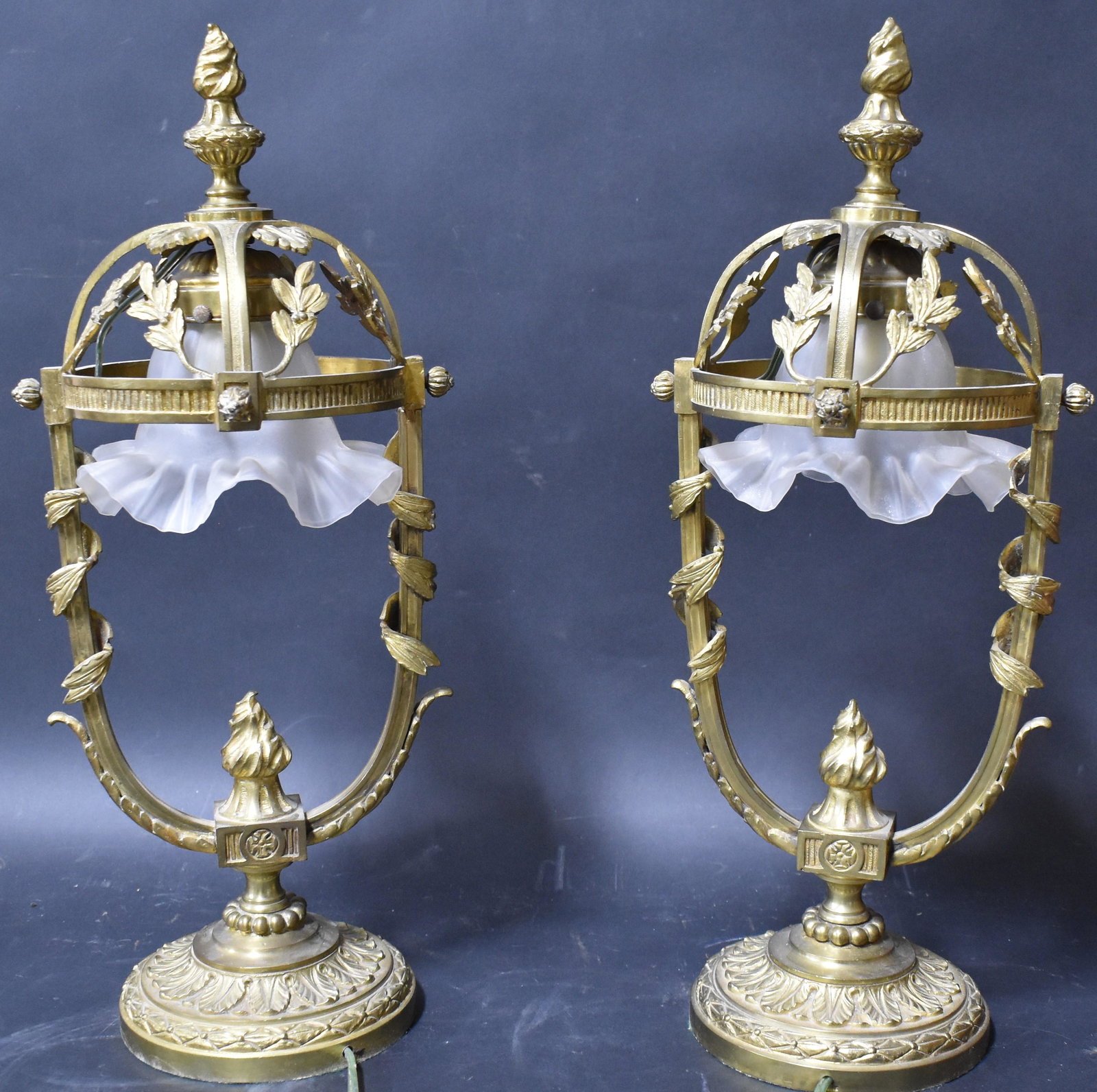 Pr. Vic French Bronze Lamps: Pair of Victorian French bronze lamps, harp sides, bonnet tops with finials. Size pair of lamps: 19 x 7 1/2 x 7 1/2 in