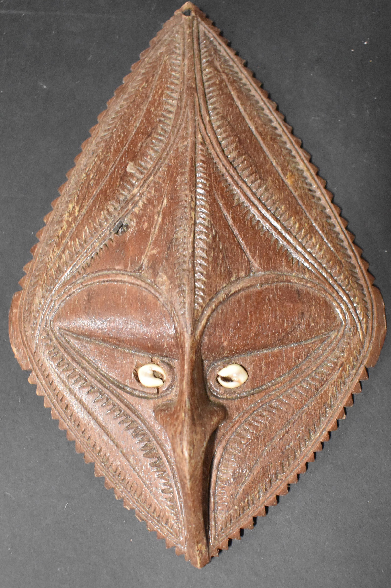 Rare Maori Pectoral Shield: Warn around neck to show Rank with shell eyes. Size 7".****This, an item from a local elder, older than his 60 years, up until this past month, a very active, eclectic and constant collector. Respondi