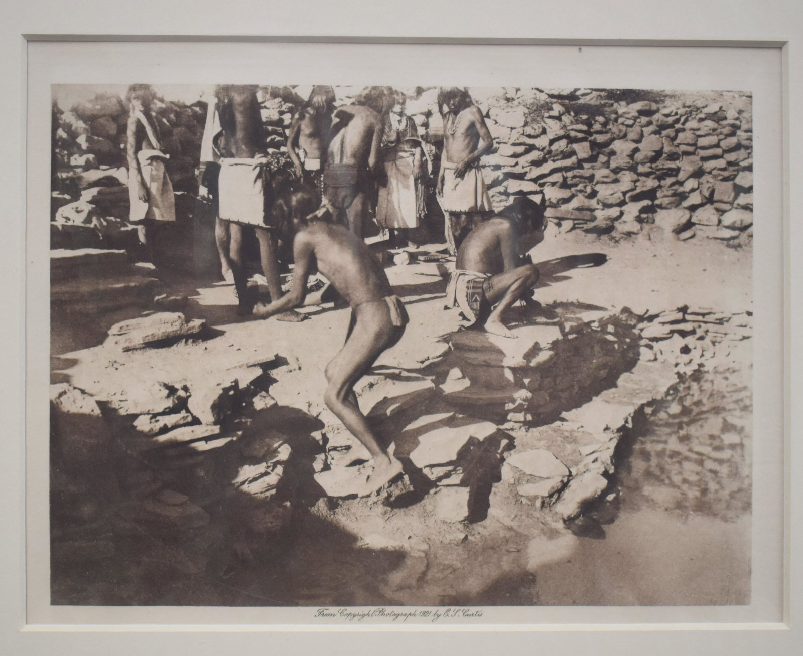 Edward Sheriff Curtis. Orig Photogravure.: Seattle, Wash. "Flute Dancers Dressing at Kachina House" Copyright 1921 Holland Van Gelder paper From Curtis's North American Indian. 6"x8" Overall 20"x16"