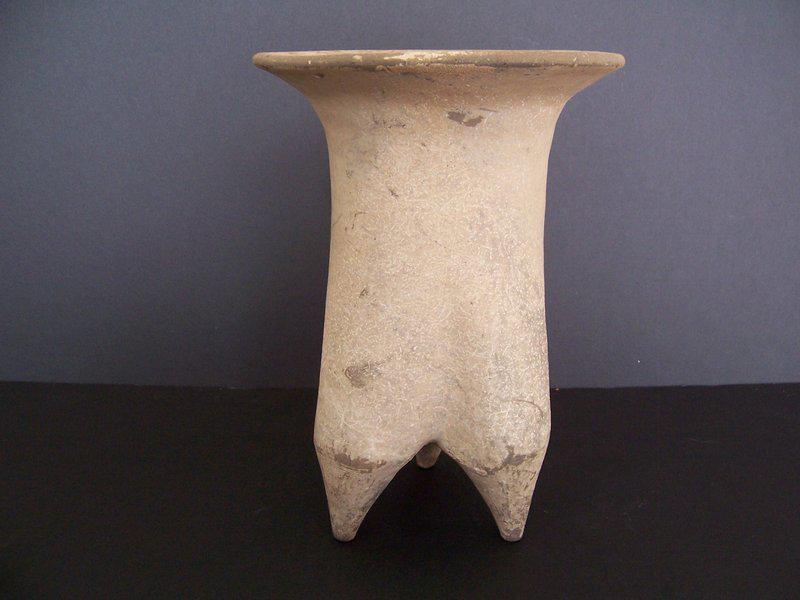 Neolithic Xiajiadian Culture Tripod 2500-1500 BC: From our Early Chinese Collection, an excellent neolithic tripod (Li) pottery vessel from the Xiajiadian Culture of either Inner Mongolia or Liaoning Province, circa 2500-1500 BC. These strange, other