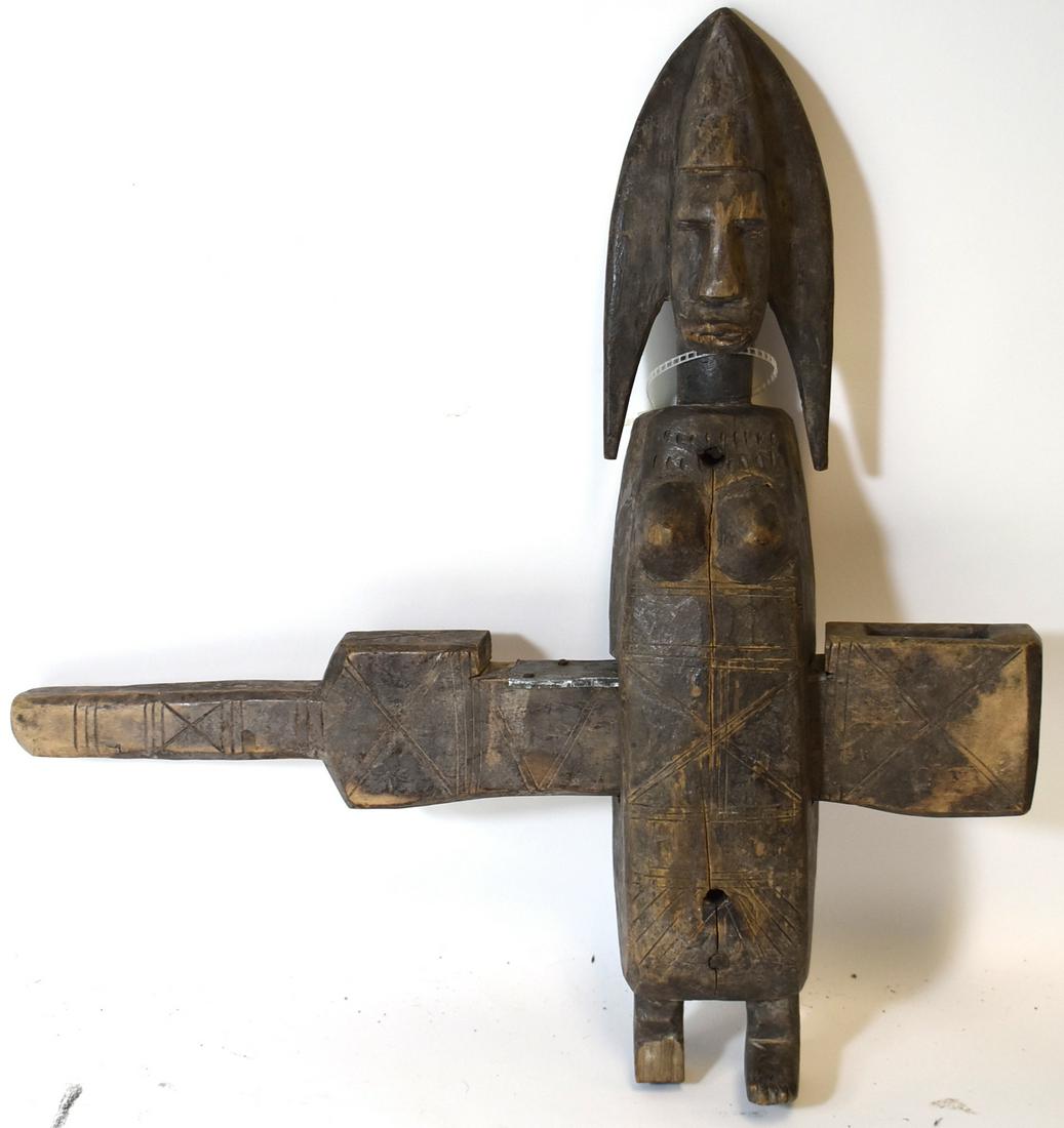 An Old Bambaran Grainery Door Lock: Figural female form, engraved surfaces, right front foot missing, natural untouched patina. 17.75" H, 17" L