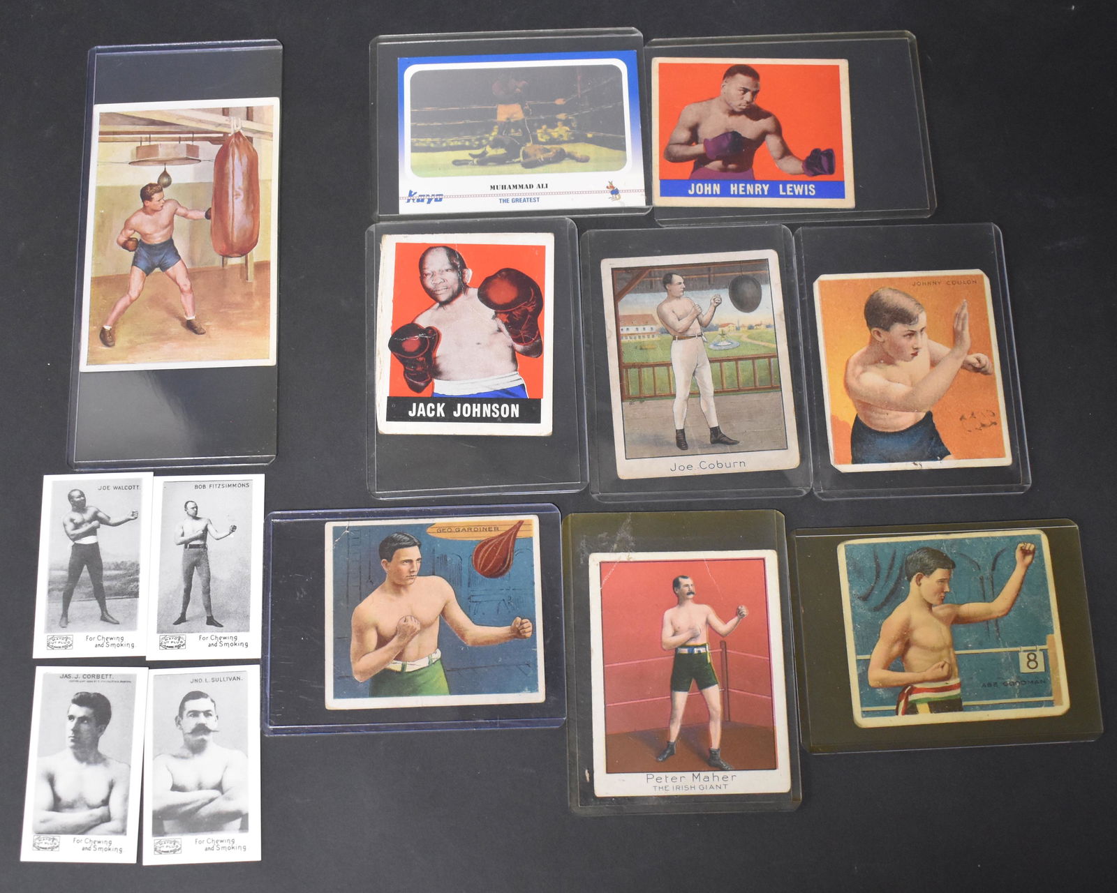 Vintage Boxing Cards. Mecca. Hassan (13): Nine Orignal. 4 Reprinted Cards. 2- 1919 T21B Hassan. 2 1910 t218 Mecca. 1 1910 T220 Mecca. 2 1948 Leaf Jack Johnson. 1 1932 Sanella Schmeling. 1 Kayo Ali Hologram.