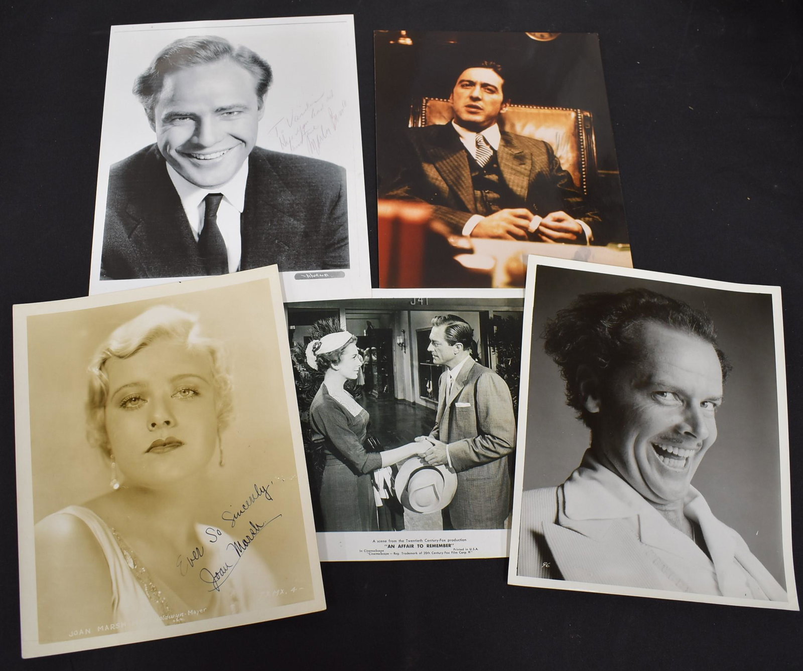 Vintage Movie Photos Inc. Sgd Brando & Marsh: MGM publicity photo of Joan Marsh, signed in ink; Marlon Brando signed in ink; an Affair to Remember; Al Pacino in the Godfather; and Jack Nicholson. 5 in the lot, all 8 x 10.
