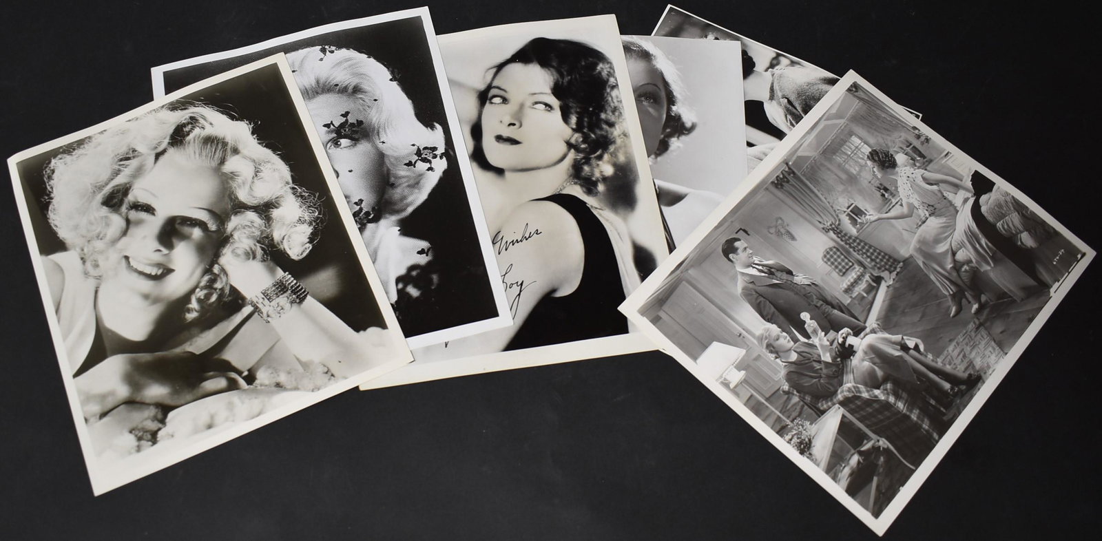 Vintage Movie Stills Inc. Sgd. Myrna Loy (6): Sgd. Myrna Loy photo with back stamp for Douglas Whitney Collection; 3 additional Myrna Loy photos, a glamour shot and two 1933 MGM publicity photos for When Ladies Meet. Unusual Dorris Day photo on c