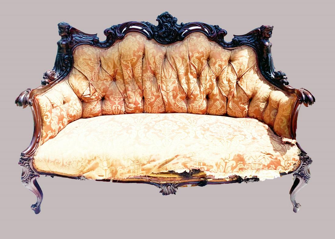 Rare R.J. Horner Heavily Carved Settee: Heavily carved Victorian settee of note with carved figures at the sides of the backrail. Cabriole carved legs. Probably walnut. Button tufted back for the original upholstery. Needs replacement. 41"H