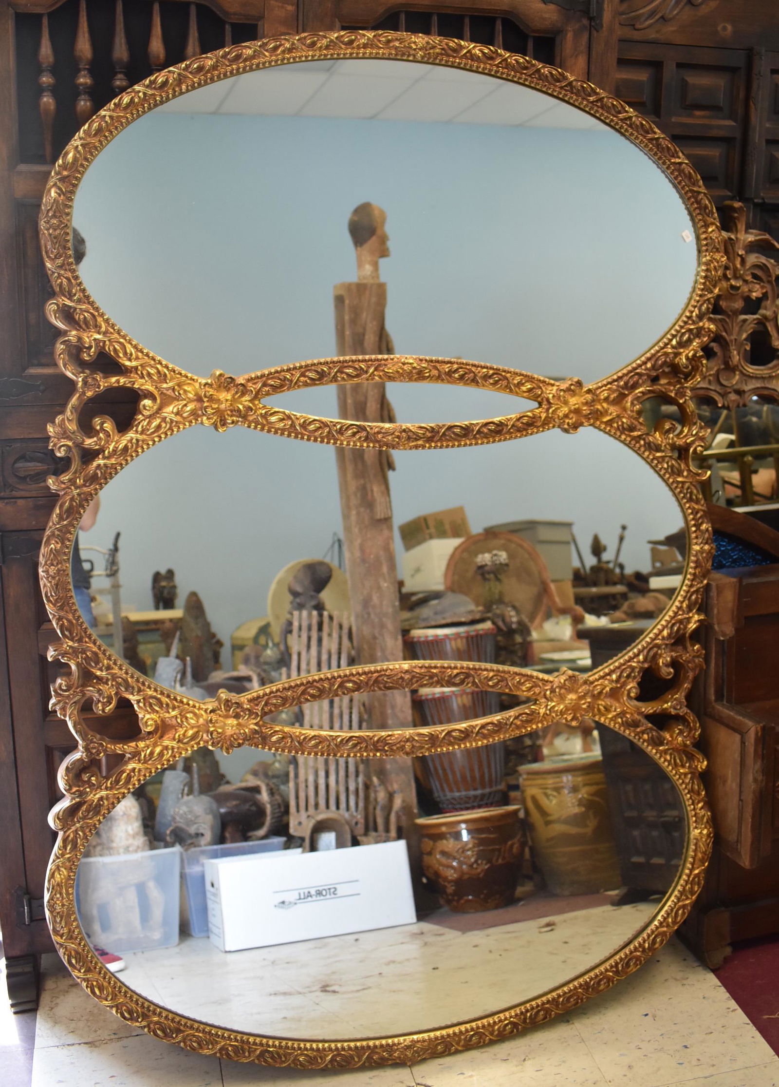 Unusual Triple Sectioned Antique Mirror: Gilded carved ornate frame. 45"H. x 66"W