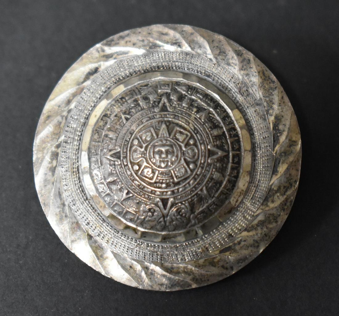 Antique Mexican Sterling Silver Brooch/Pendant: Marked Hechoen, Mexico Sterling 925 and with a maker's mark. 1.25"D