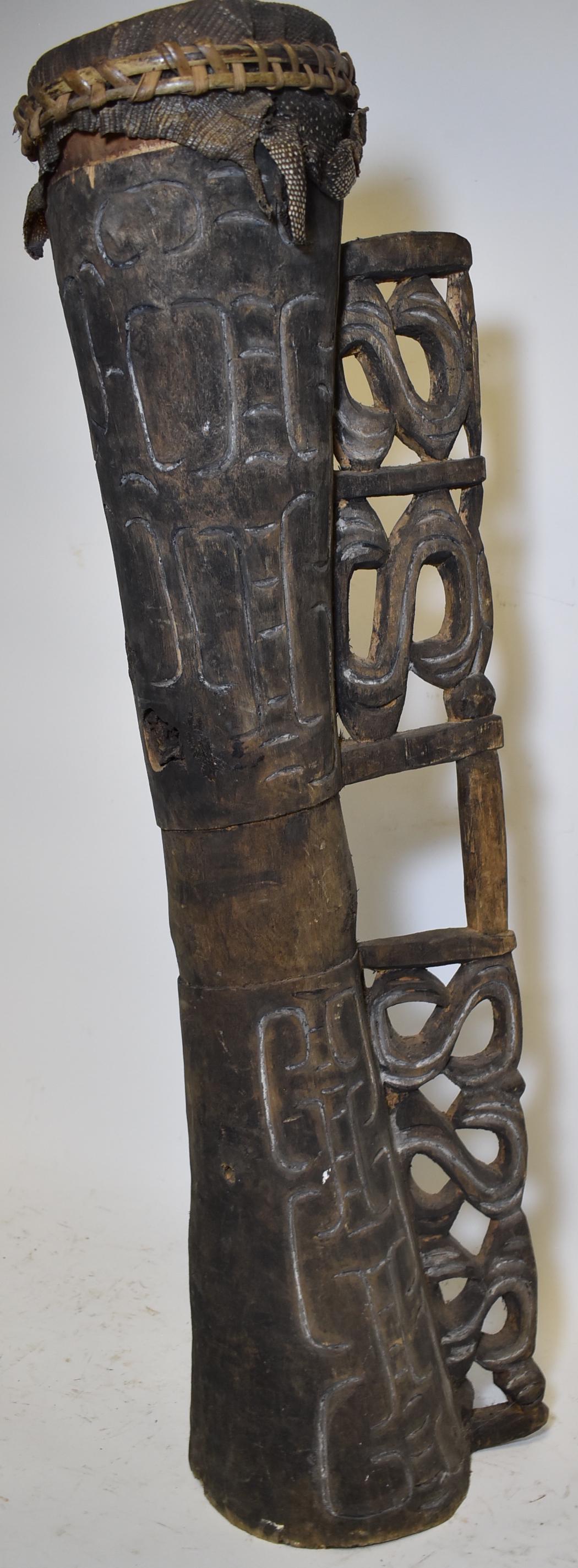 Larger Hourglass Drum, Asmat, New Guinea: Possibly orignal reptile 37" high