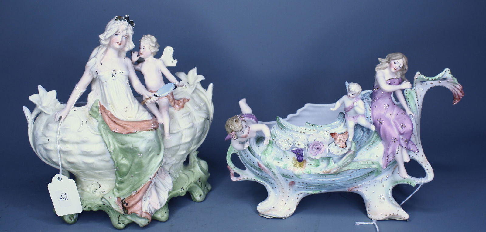 Pr. German Antique Figures: Antique Elaborate parian/bisque groupings with hand painted detail. Marked DEP and 7245 6 3/4"H and 7 1/4"H.
