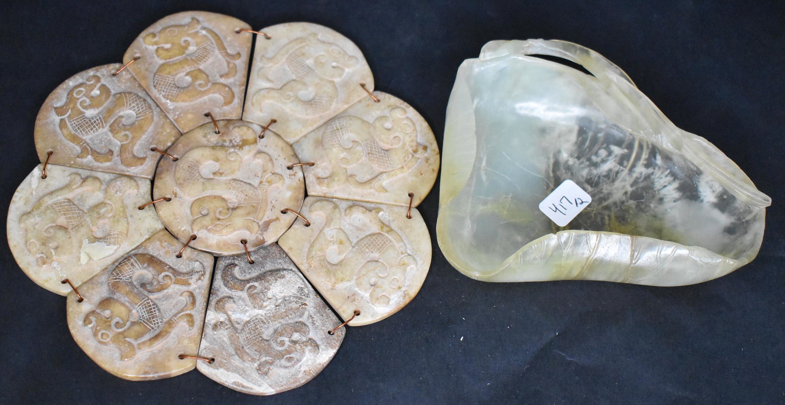 Jade Trivet & A Second Jade Dish: 9-Sectioned tribut has 6.5" diameter; Included in the lot is an antique jade dish with minor imperfections at the edge. 5" long by 4" wide. 2 items in the lot.