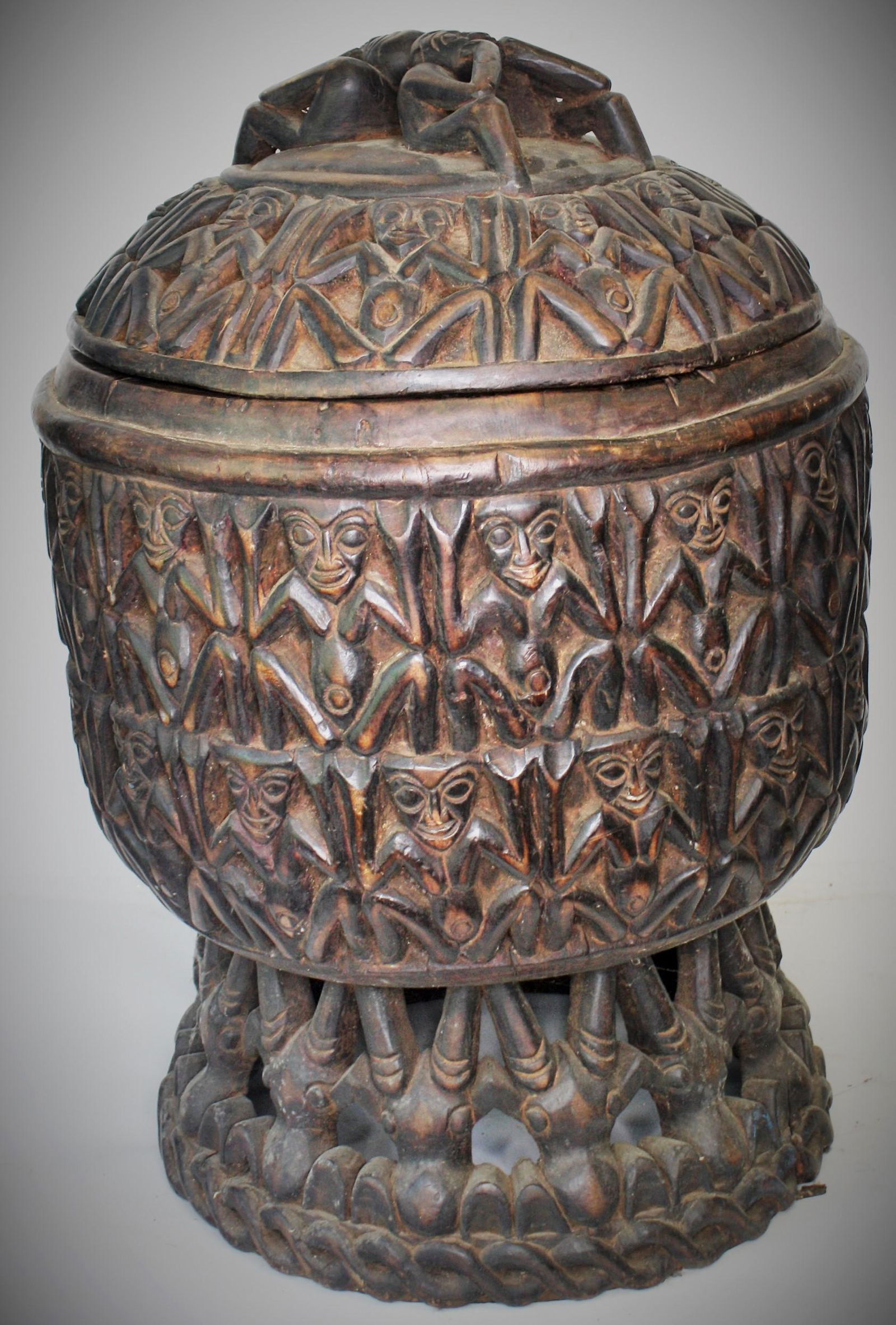 Exceptional Cameroon Blood Pot: Bamum. Excellent Condition. Carved all over registers of female figures. Openwork base. Untouched surface. 29"H. 20"D
