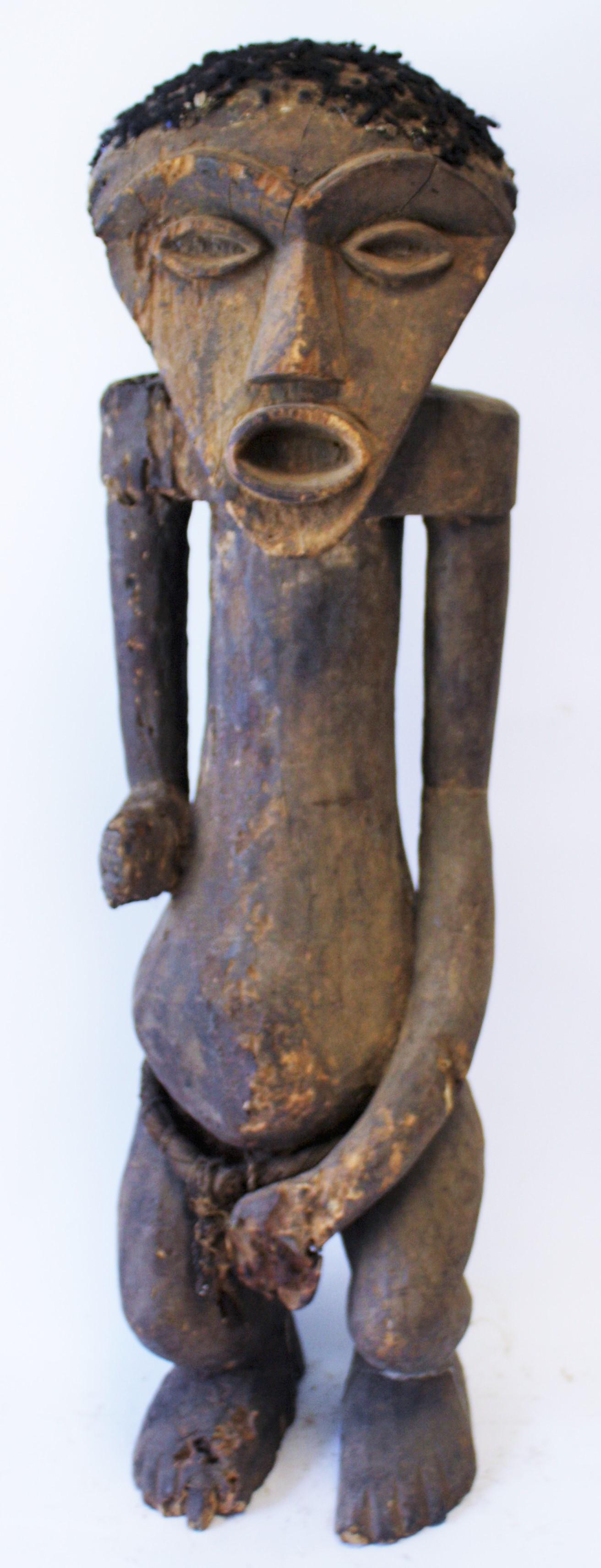Ancient Tribal Male Figure: Probably Cross River area of Nigeria and Cameroon Totally untouched surface. Inserted plugs of real hair. Early 19th C. 38 1/2"H.