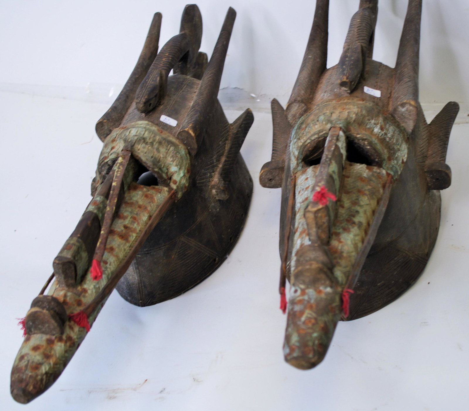 Rare & Fine Pr Bamana Antelope Masks, Mali: Rare & Fine Pr Bamana Antelope Masks, Mali. Perhaps male and female One slightly smaller. Interesting good old tooled metal attachemnts. Good untouched surfaces . Possibly 19th C. 26" and 25"
