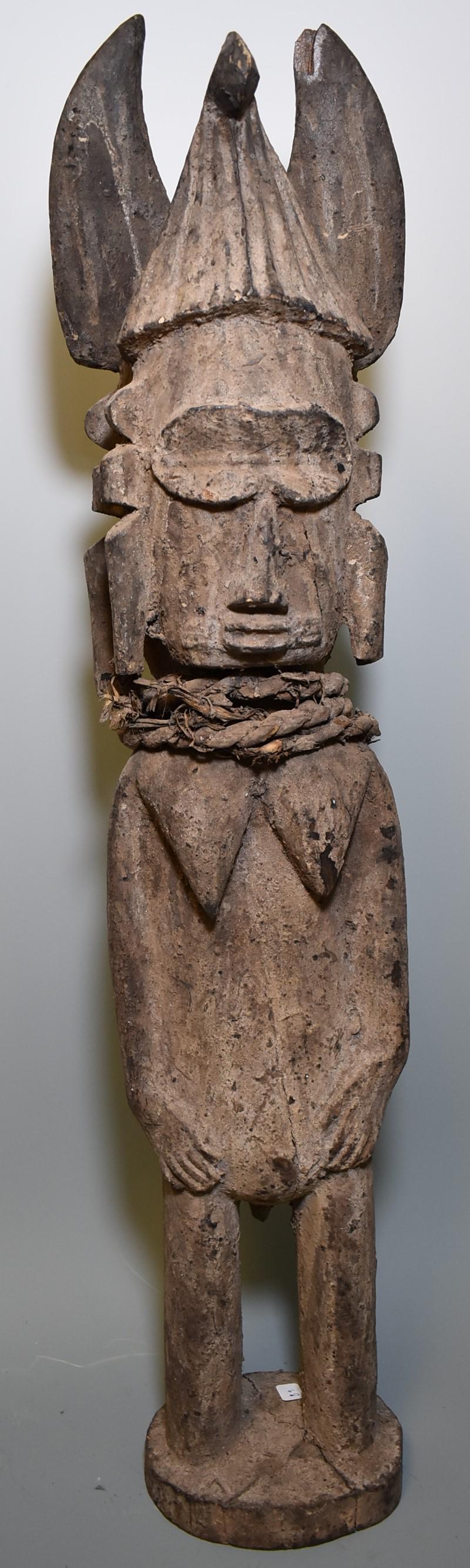 Dual Gendered Djimini Figure.: Deferring to the museum. Extremely heavy wood with old coats of magical substance. A rare type called by the museum Djimini people. Ivory Coast. Heavy with untouched surface. 27"H