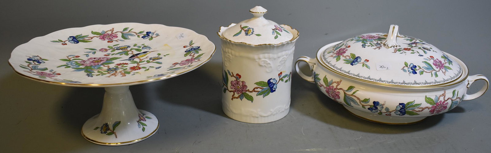 English Aynsley Porcelain Serving Pcs.: Included in the lot is a covered casserole, a footed compote and a covered jar. Three in the lot. Varying sizes