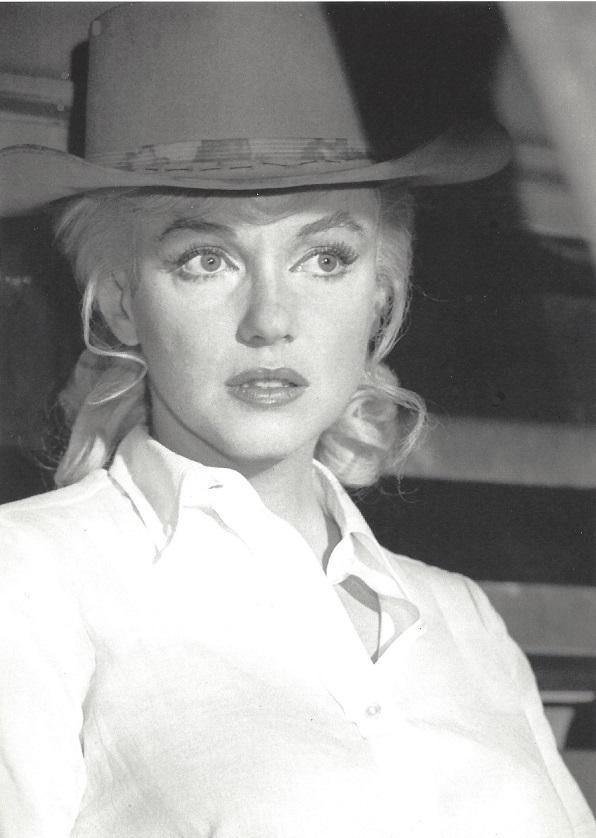 Marilyn Monroe Eve Arnold Publication Photo: Original Publication Photo, measuring approximately, 7.5"x5.5" includes white border. Taken in 1960, printed 1999. It comes stamped by the photographer and agency. The photograph is printed on double