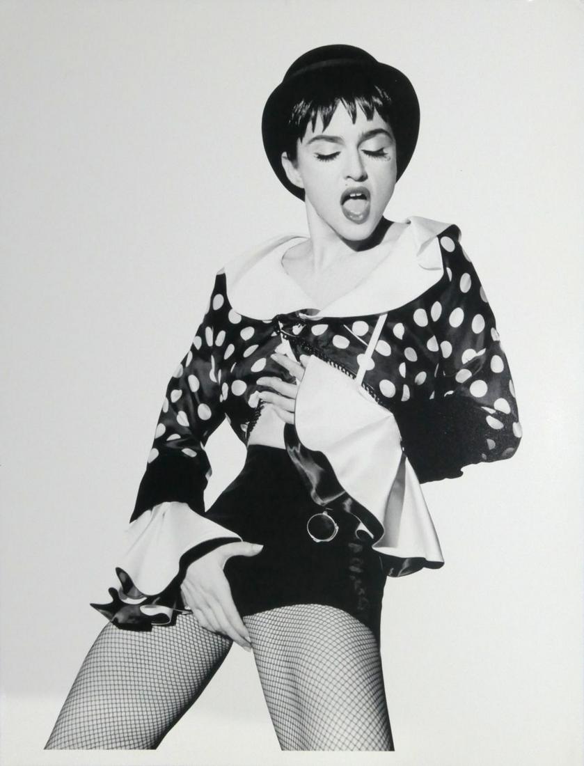 Madonna Original Herb Ritt Pubication Photo: This photograph by world renowned photographer Herb Ritts shows a young and sexy Madonna. Herb Ritts was Madonna's most favoriate photographer. Photograph measures 17" x 13". The photograph is stamped