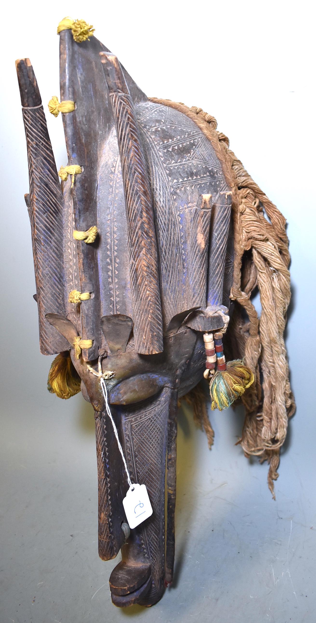 Strong Antique Malian Mask: Bambara Bamana With metal cladding, beadwork etc. Tightly engraved surface. 21 1/2"H