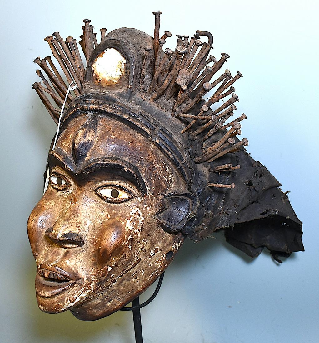 Exceptional Bakongo Sorcerer's Mask: Exceptiional Bakongo sorcerer\'s mask. Intact with fetish materials and woven hood. Strong glass eyes. 13\"H