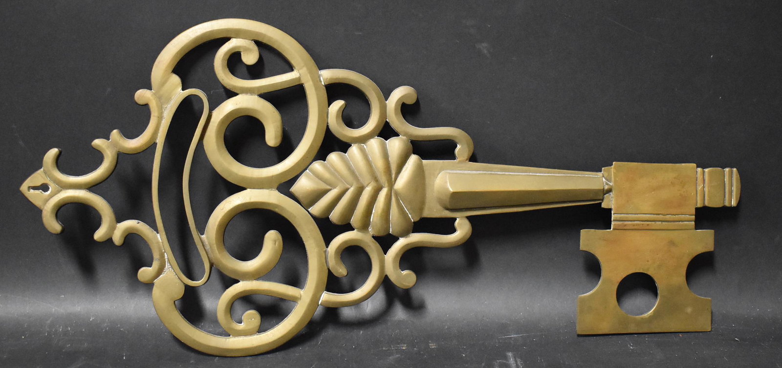 Antique Brass Figural Key: 19.5" Long. Purpose unknown.