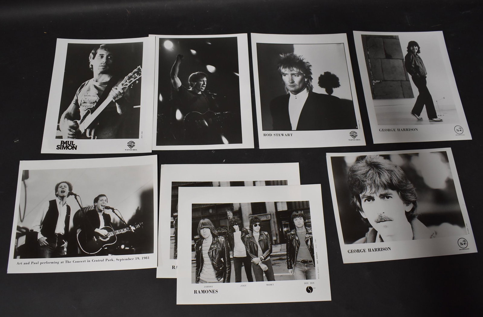 Vintage Musical Group Photographs (8): 8" x 10". Includes George Harrison (2), The Ramones (2), Rod Stewart (1), Paul Simon (3)