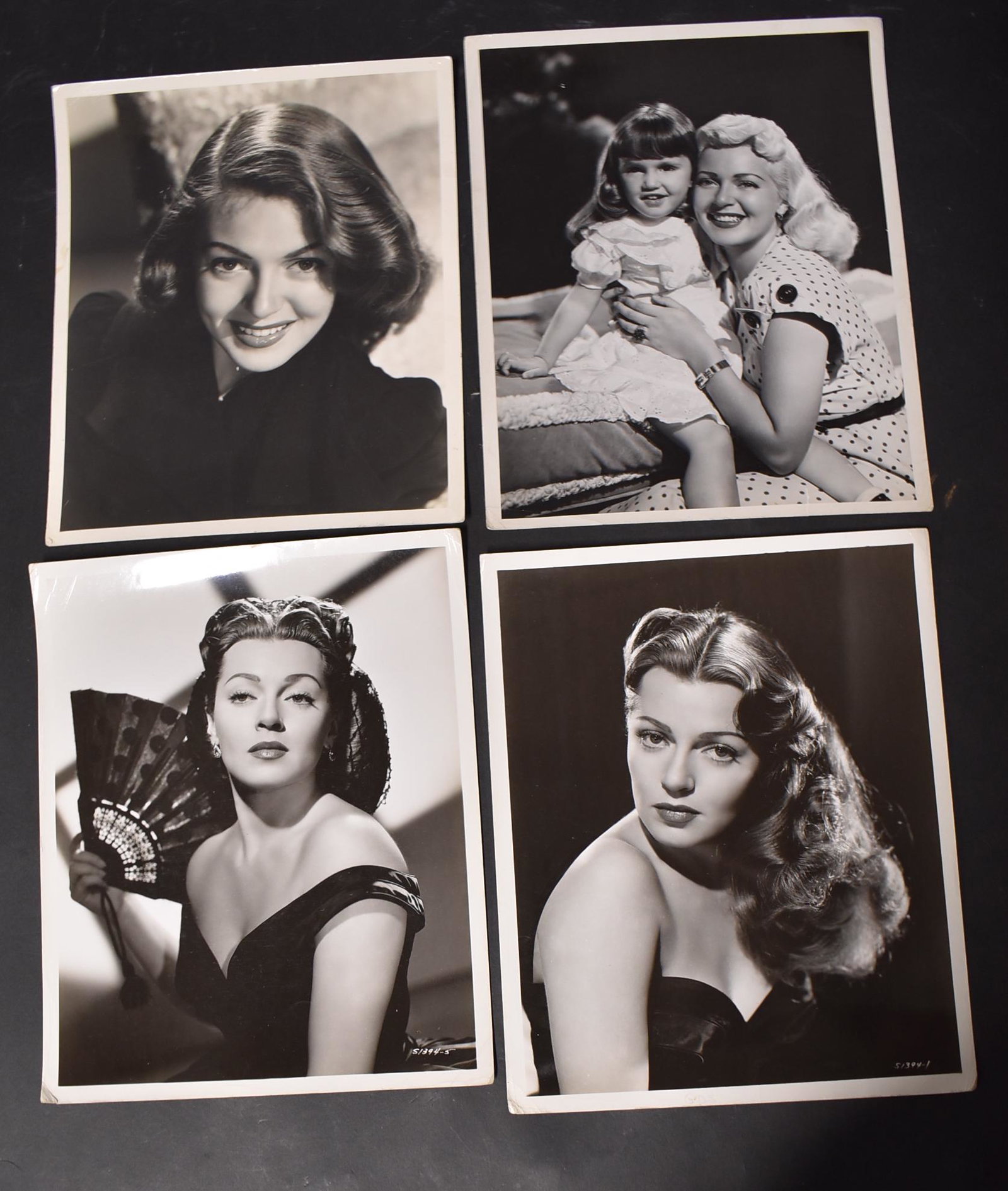 Lana Turner Photographs. One by Willinger.: 4 in the lot. The 1946 MGM photo by Willinger w/ back stamp for studio and photographer. Publicity snipe "Ziegfeld Girl". Remaining 3 photos all with publicity snipes for "Green Dolphin Street". All 8