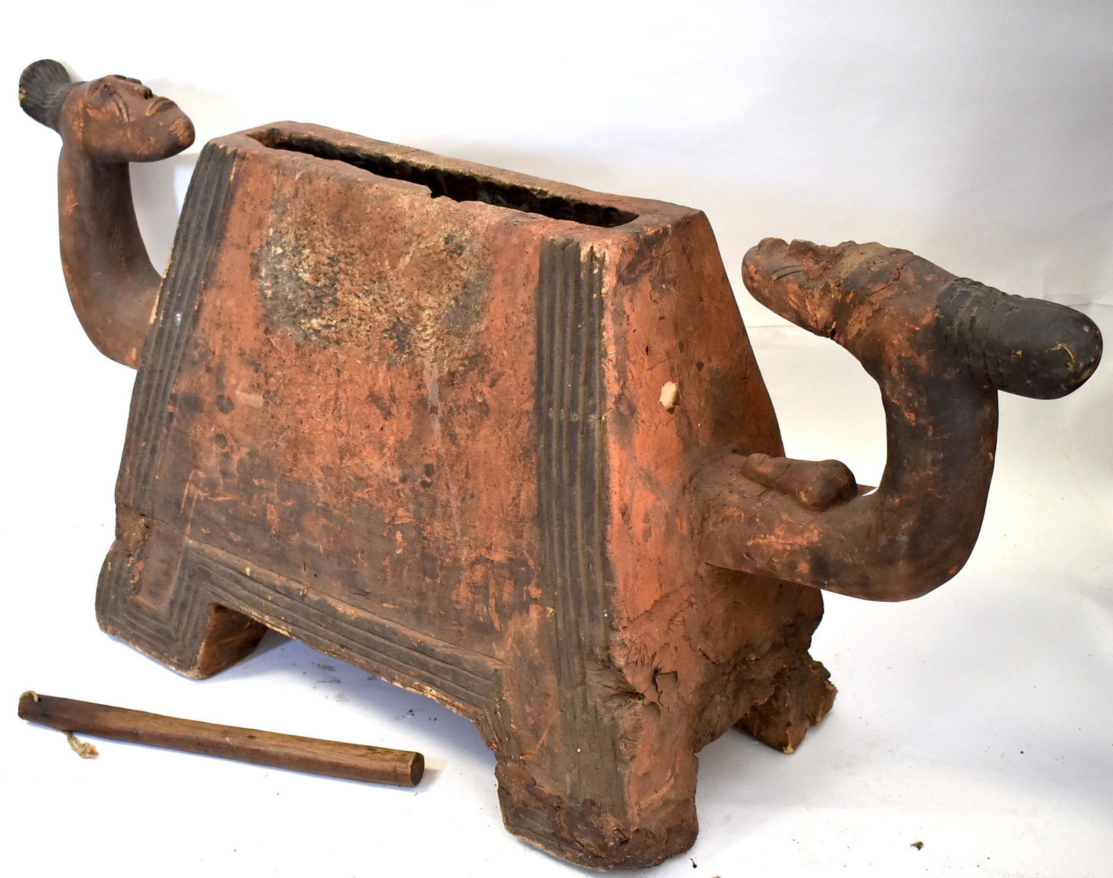 Rare and Massive Communal Slit Drum.: Pride of the Museum. Social Intrusment for calling Tribal Meetings. Untouched Natural Surfaace Great age. Has orignal drum Stick. In our opinion, the finest example ever found. Probably Tanzania. Size