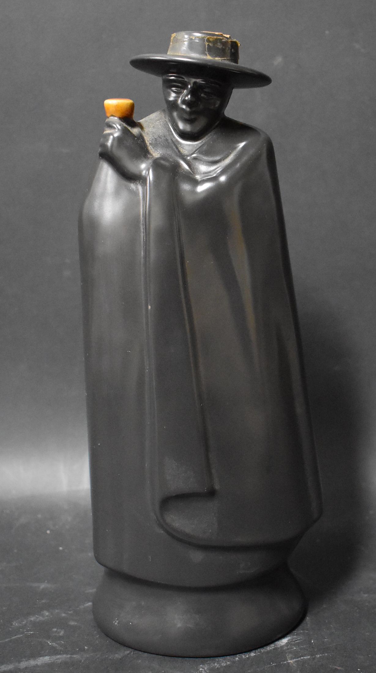 Wedgwood Liquor Bottle: Cloaked Man. 10" tall.