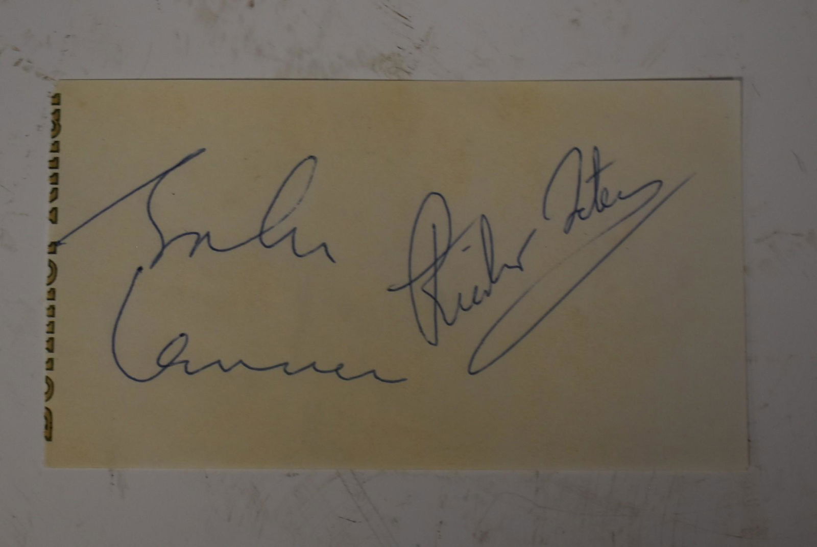 John Lennon Autograph 1966: A resident from Essel (Germany) saw John Lennon (6/9/66) in front of a restaurant. She went into the restaurant and asked for a note and pen. She got a beer commercial paper. John Lennon signed with R