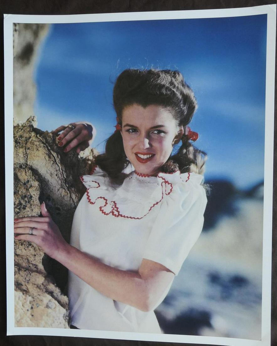 Marilyn Monroe Andre DeDienes Publication Display Photo: Original Publication Photo, measuring approximately, 16"x13" includes white border. Taken in 1945, printed 1999. It comes stamped by the photographer and agency. The photograph is printed on double we