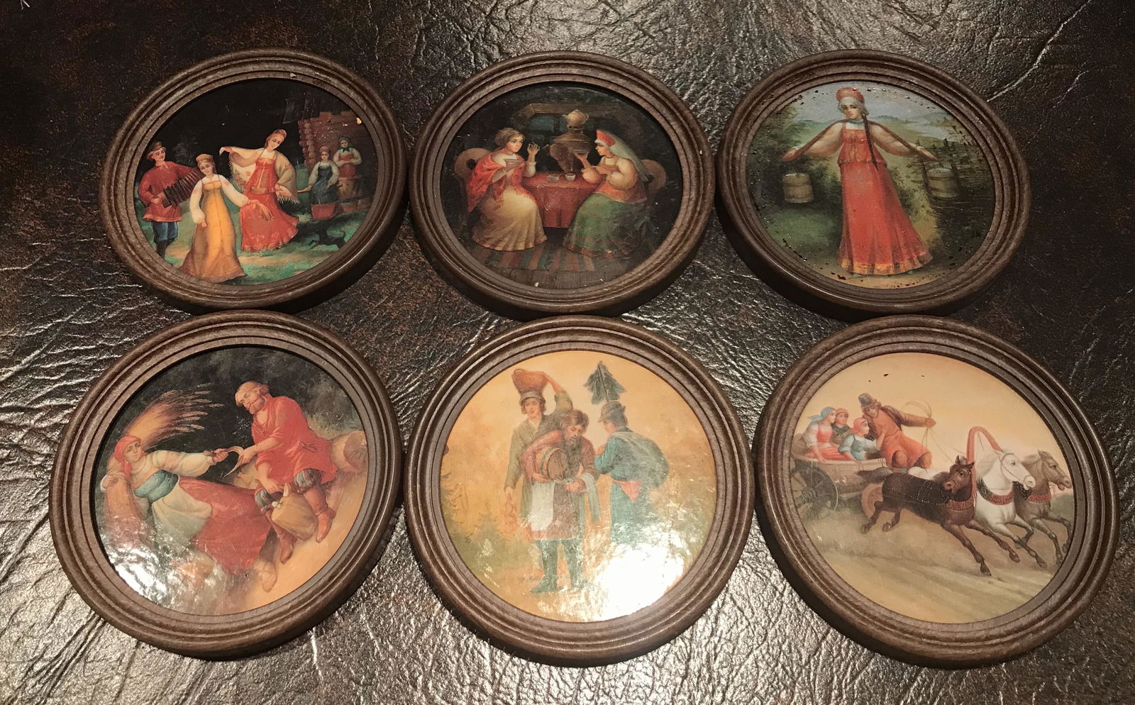 Godinger Ornate Silver Plated Wine Coaster: Godinger 7 inches wide. Included in the lor are 6 drink coasters with classical paintings depicted.