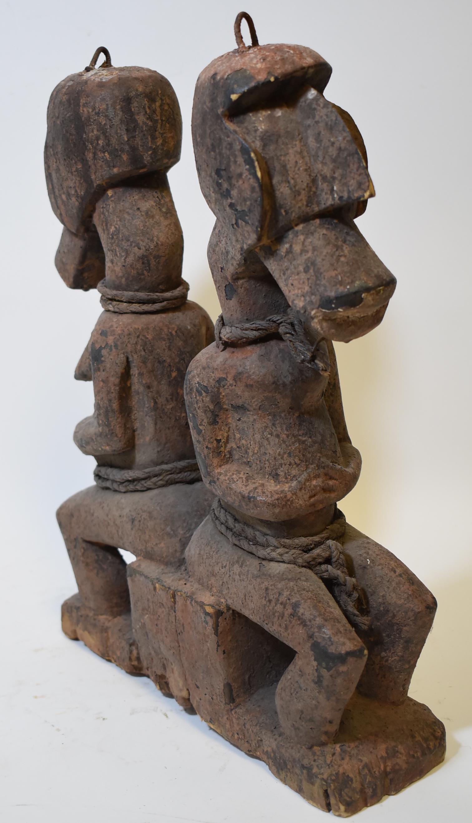 West African Twin Figure Prob. Ivory Coast: Back to back male and female. Strong untouched sacrificial surfaces. Turn of the Century 15 1/2"H. 12"W. base