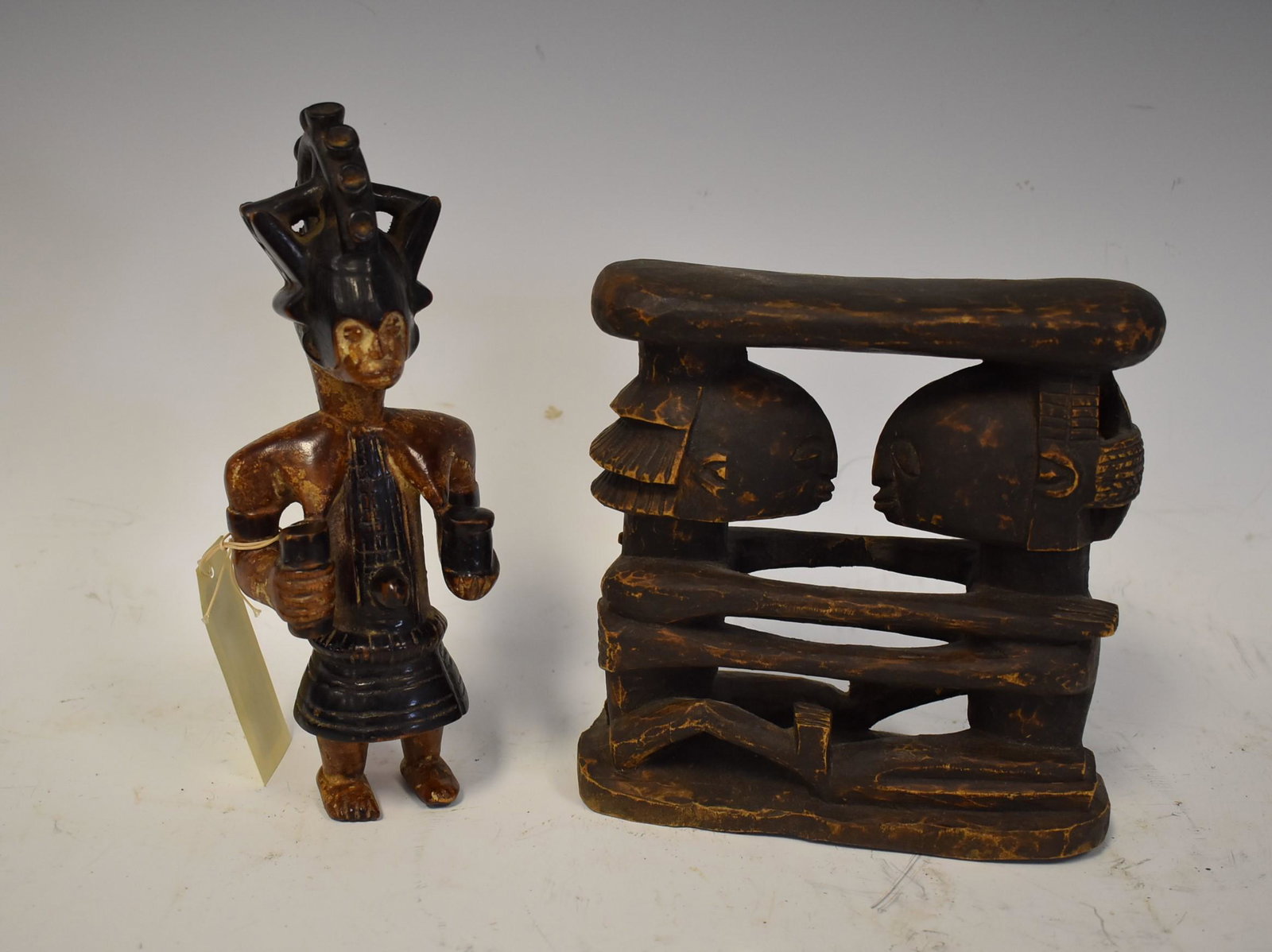 Fine Igbo Carver's Modelo & a 2nd: Nigeria. Master Carver's miniature model as guidance to his atelier, 20th C. Two color surface. Together with a Congolese neck rest Luba people embracing couple 9"And 7"H