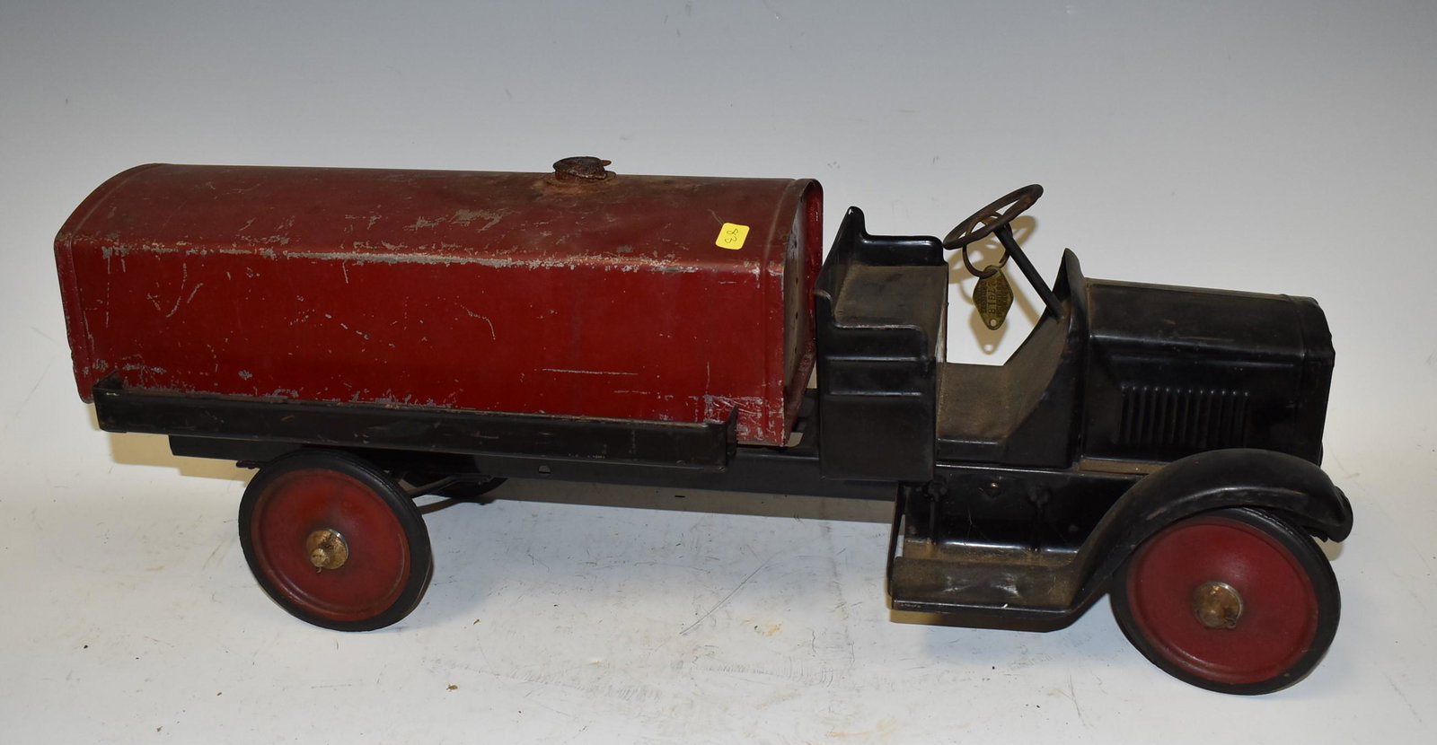 Buddy L 1920's Oil Truck: Turning wheel still turns wheels. Size 25"L x 7"H x 10"W