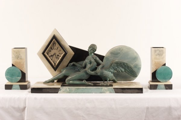 ART DECO BRONZED AND MARBLE CLOCK SET: marble alabaster & white metal, Leda and the Swan, 13in. H. x 25in.W., with garnitures(base chips)
