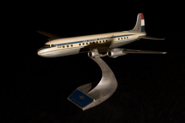 KLM AIRLINES ALUMINUM AIRPLANE MODEL: painted aluminum, The Flying Dutchman;Douglas DC7C, 18in. L. x 19 in.W, on original aluminum base with Douglas emblem