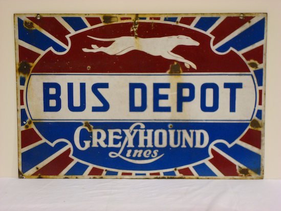 VINTAGE ENAMELED GREYHOUND BUS SIGN: enameled metal, Greyhound Lines Bus Depot, 20in. x 30in., enamel loss