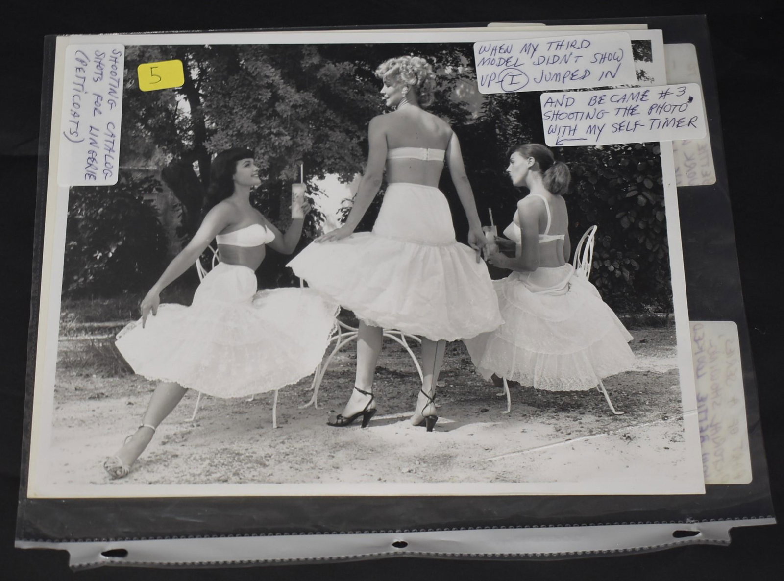 Bettie Page Bunny Yeager Catalog Photo: Notes that a model did not show up so Yeager filled in. Group lingerie photo. 8 inches x 10 inches.