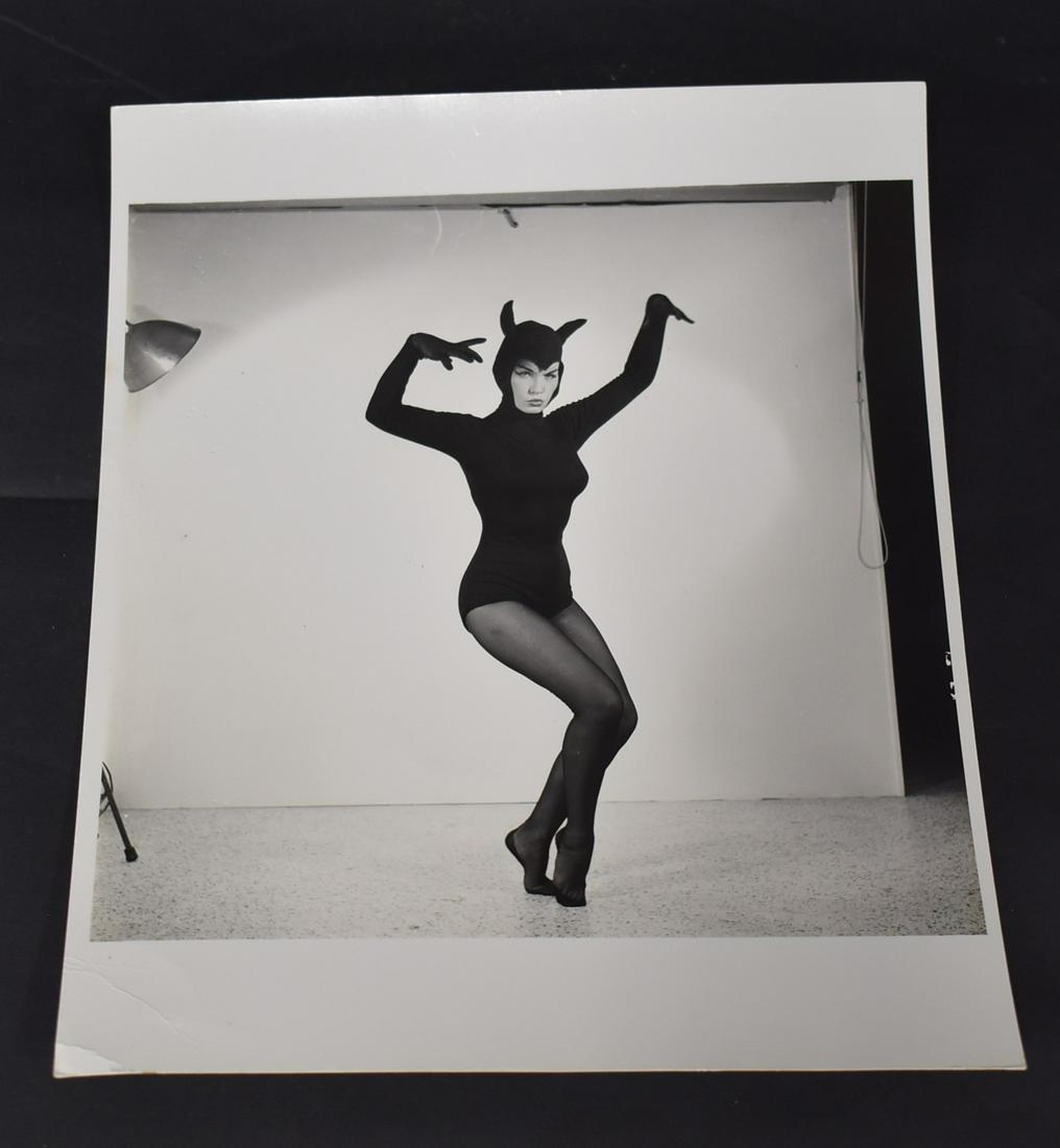 Bettie Page Devil Photo Eric Kroll Era: Eric Kroll era. All with Bunny Yeager backstamps that say represented by Eric Kroll. All signed Bunny Yeager. Double weight matte &/or semi-gloss silver gelatin. 8 inches x 10 inches.