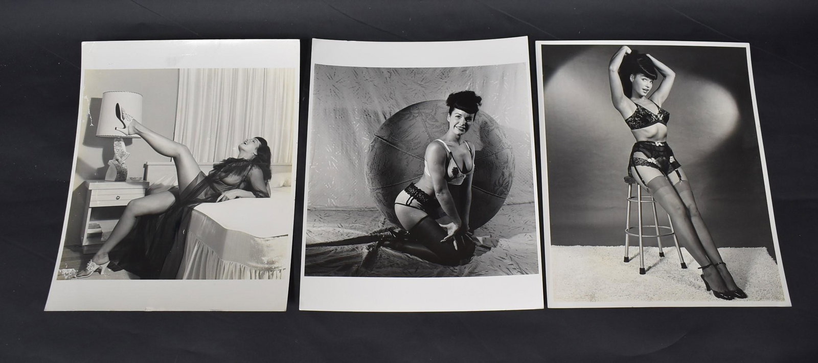 Eric Kroll Era Bettie Page Photos (3): Eric Kroll era. All with Bunny Yeager backstamps that say represented by Eric Kroll. All signed Bunny Yeager. Two stating "represented by Eric Kroll". One image says, " 198- Copyright reserved". One i