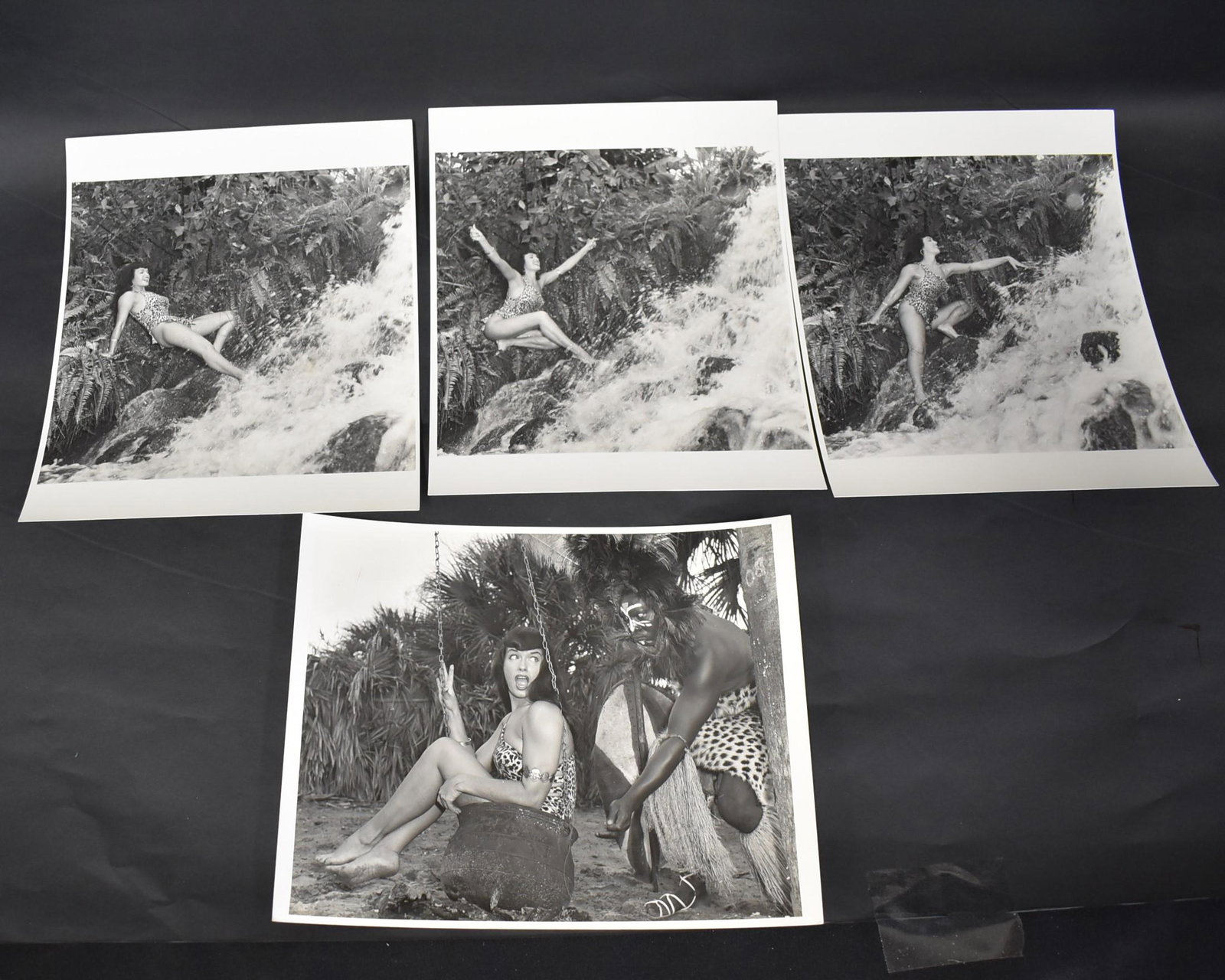 Eric Kroll Era Bettie Page Photos(4): Eric Kroll era. Two with backstamp for Bunny Yeager & Eric Kroll. Three signed by Yeager. One with Bunny Yeager label. Double weight matte &/or semi-gloss silver gelatin.8 inches x 10 inches. Included