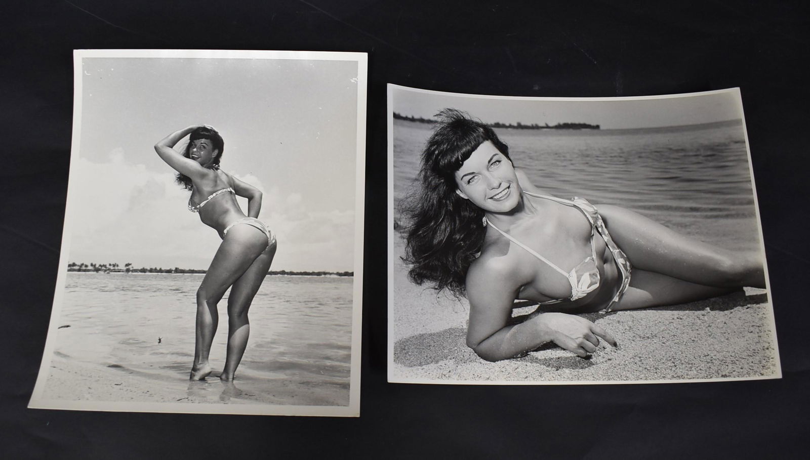 Bettie Page Photographs (2): One with a Bunny Yeager Label, 1954; One a little scene close -up with a Yeager backstamp printed in 1988. 8 x 10 inches. Double weight matte &/or semi-gloss silver gelatin.