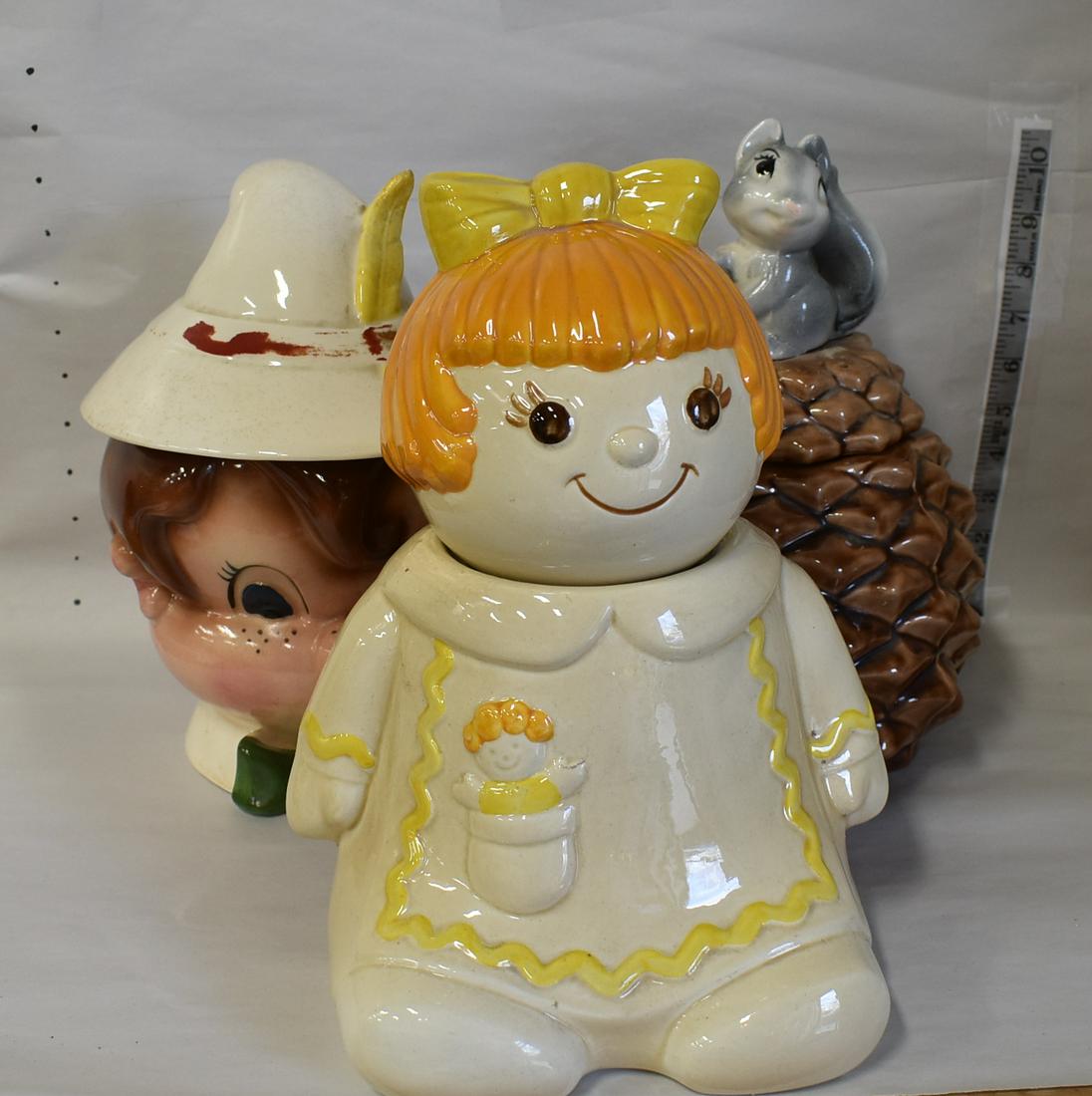 Metlox Cookie Jars (3): Squirrel in a Pine Cone; Pinocchio and a Rag Doll. Three in the lot