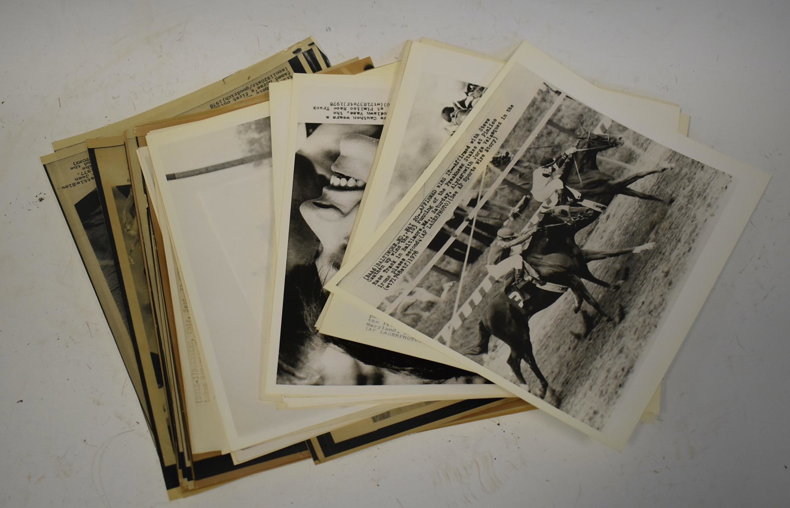 Collectors Lot of Horse Racing Photos & Ephemera: Approx. a dozen items in the lot inc. AP photos, ephemera etc. all related to jockeys and horse racing.